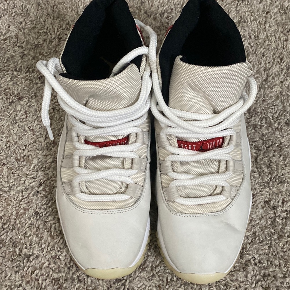 White Jordan 11s